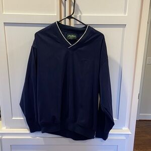 Eddie Bauer Golf Men's Deep Blue V-Neck windbreaker pullover.